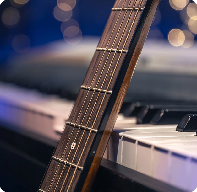 Close-up of an acoustic guitar representing music and entertainment